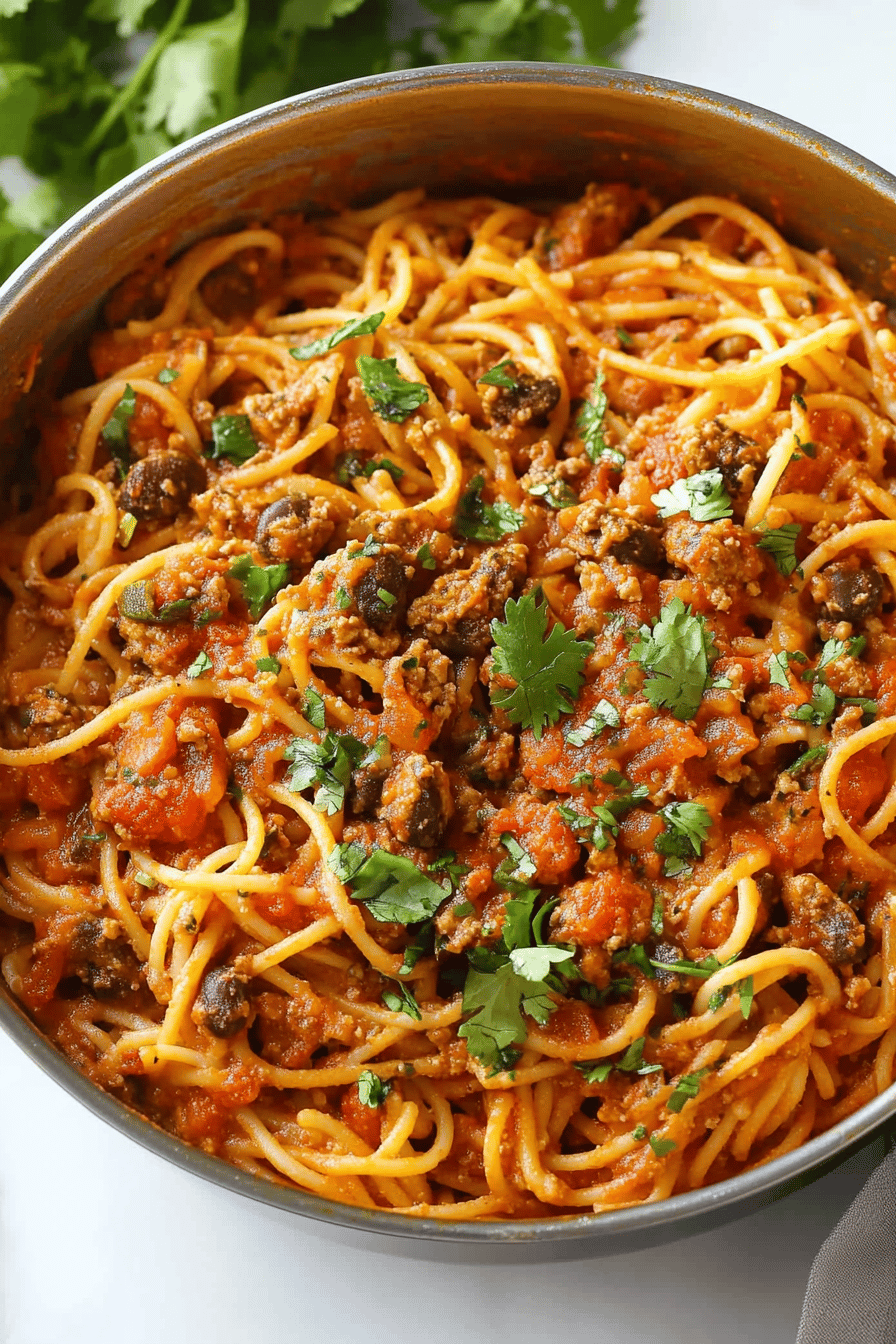 Taco Spaghetti Recipe ingredients organized and measured on kitchen counter