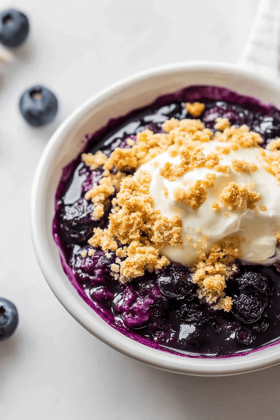 Blueberry Crumble Recipe slice on plate showing perfect texture and swirl pattern