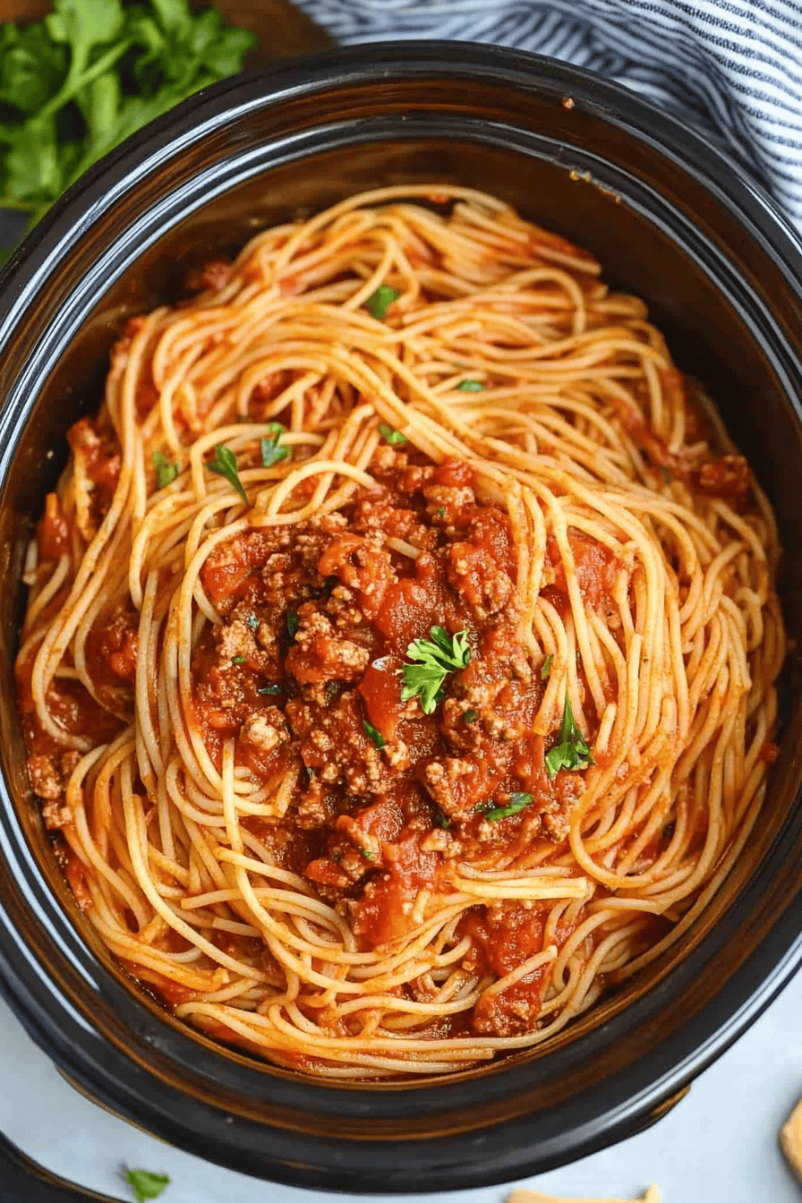 Crock-Pot Spaghetti ingredients organized and measured on kitchen counter