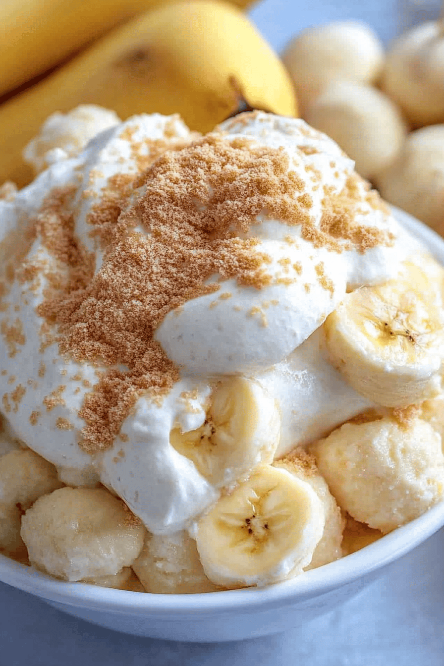 banana pudding slice on plate showing perfect texture and swirl pattern