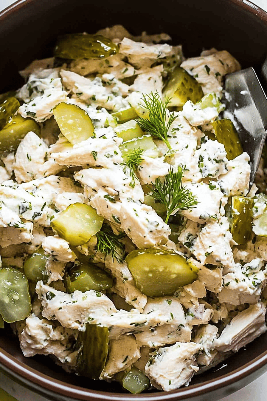 dill pickle chicken salad slice on plate showing perfect texture and swirl pattern