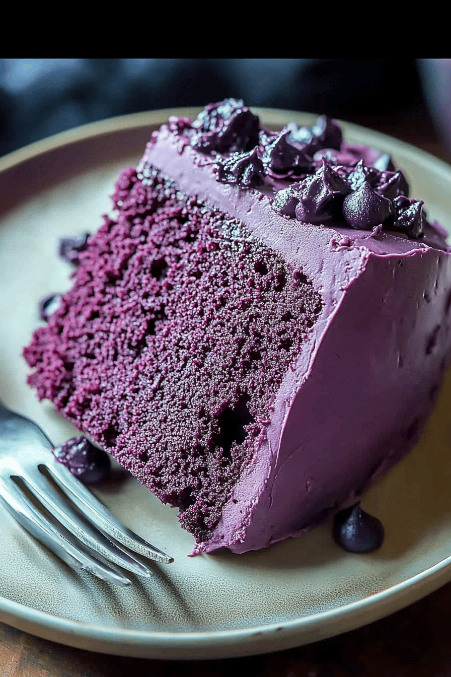 Purple velvet cake ingredients organized and measured on kitchen counter