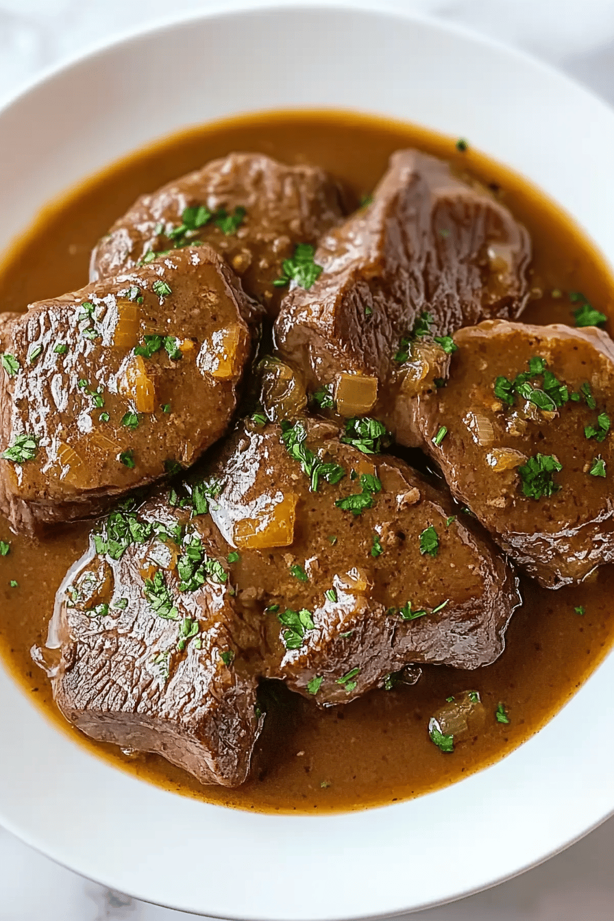 Slow cooker round steak ingredients organized and measured on kitchen counter