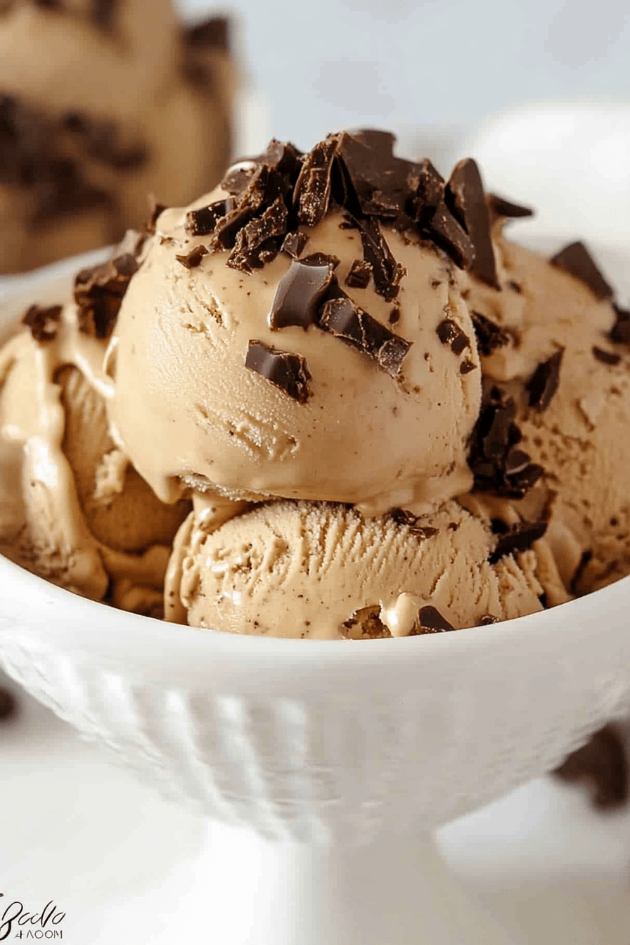 coffee toffee ice cream slice on plate showing perfect texture and swirl pattern