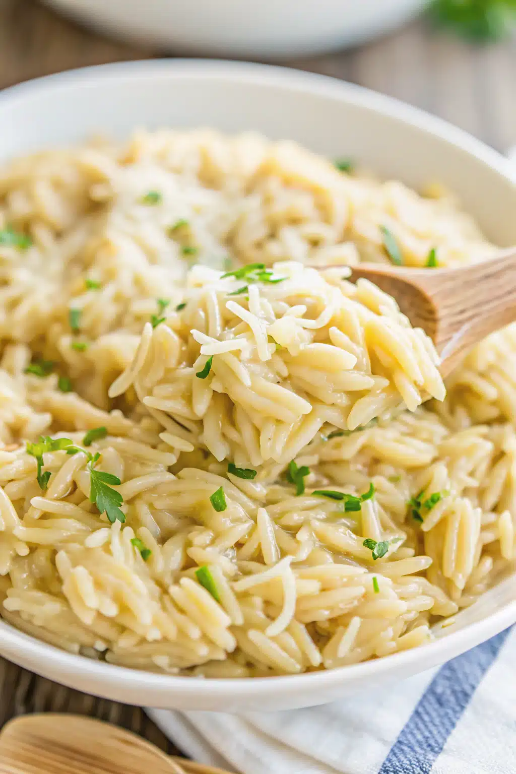 Creamy Garlic Parmesan Orzo slice on plate showing perfect texture and swirl pattern