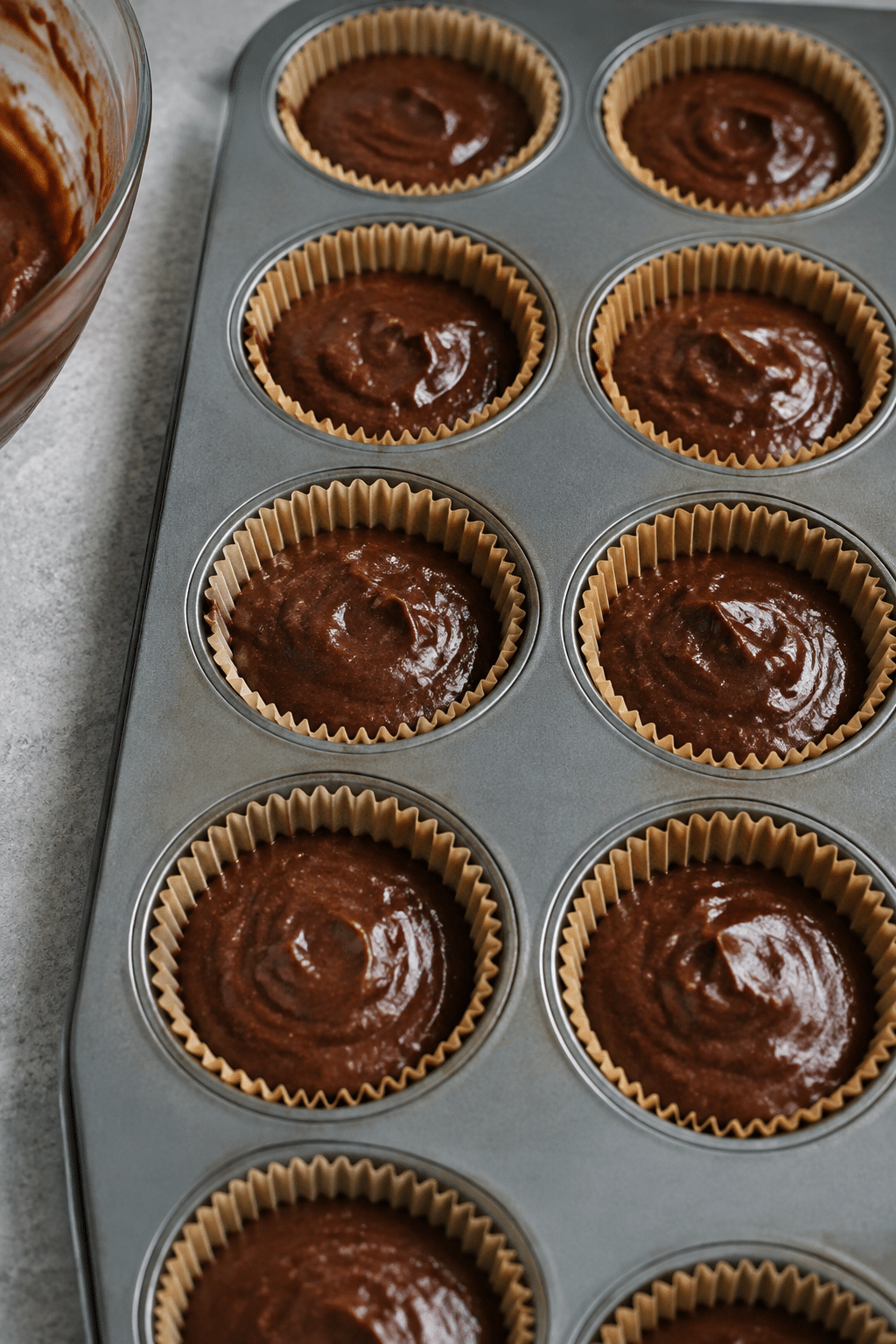 vegan chocolate cupcake batter in liners